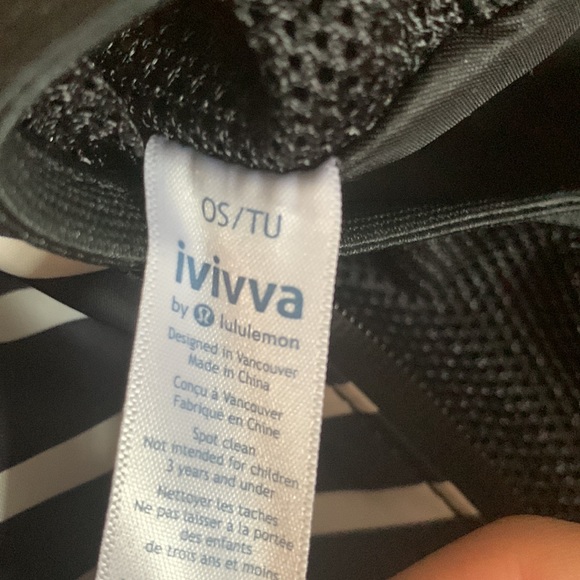 This is a black and white stripped mini backpack from Ivivva. - Picture 4 of 5
